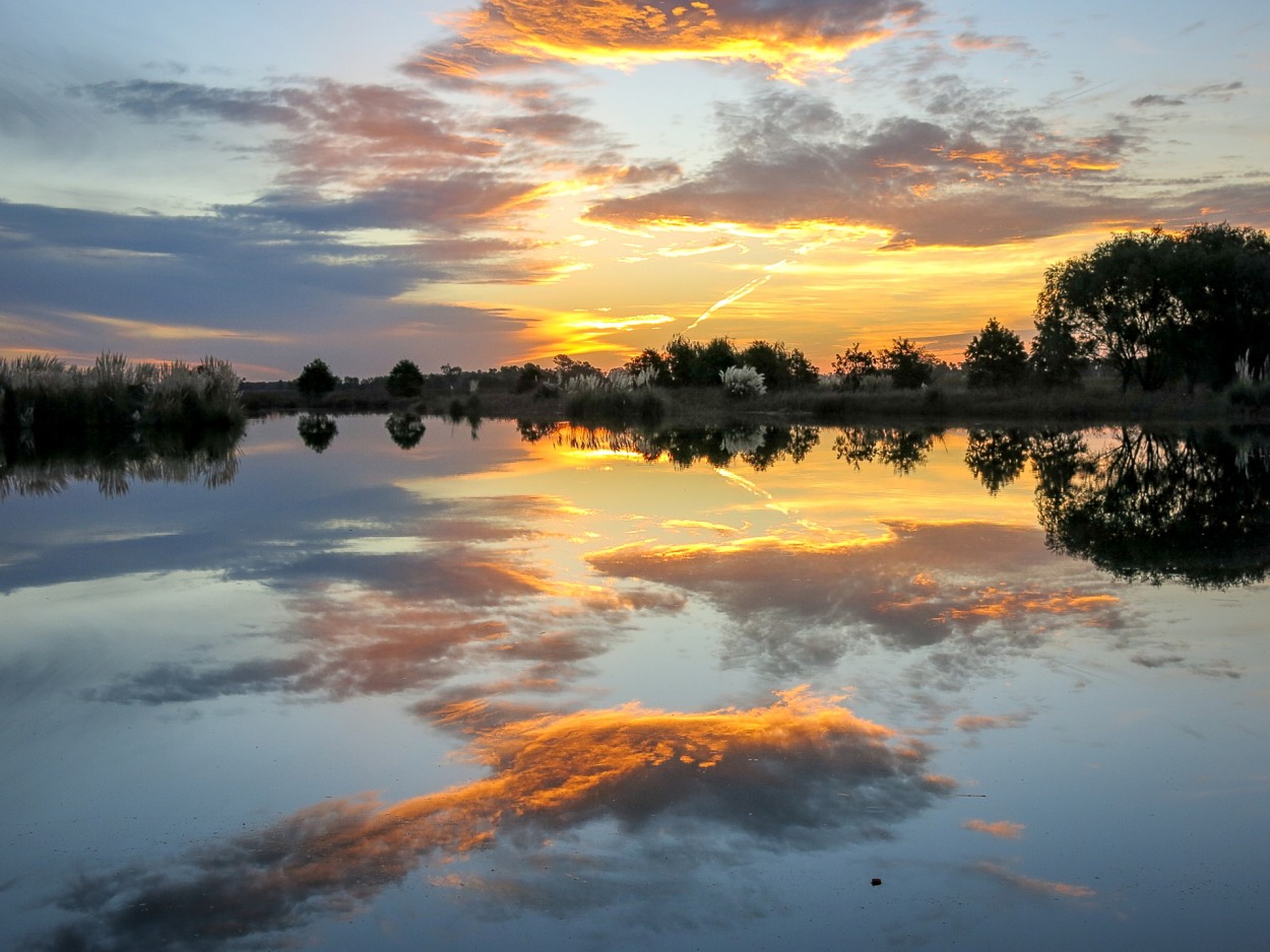 ` Atardecer en la laguna`