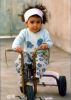 Camila en triciclo