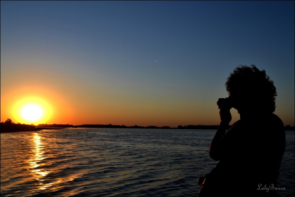 "Violeta.. fotografiando el sol!!!!" de Maria Laura Bausa