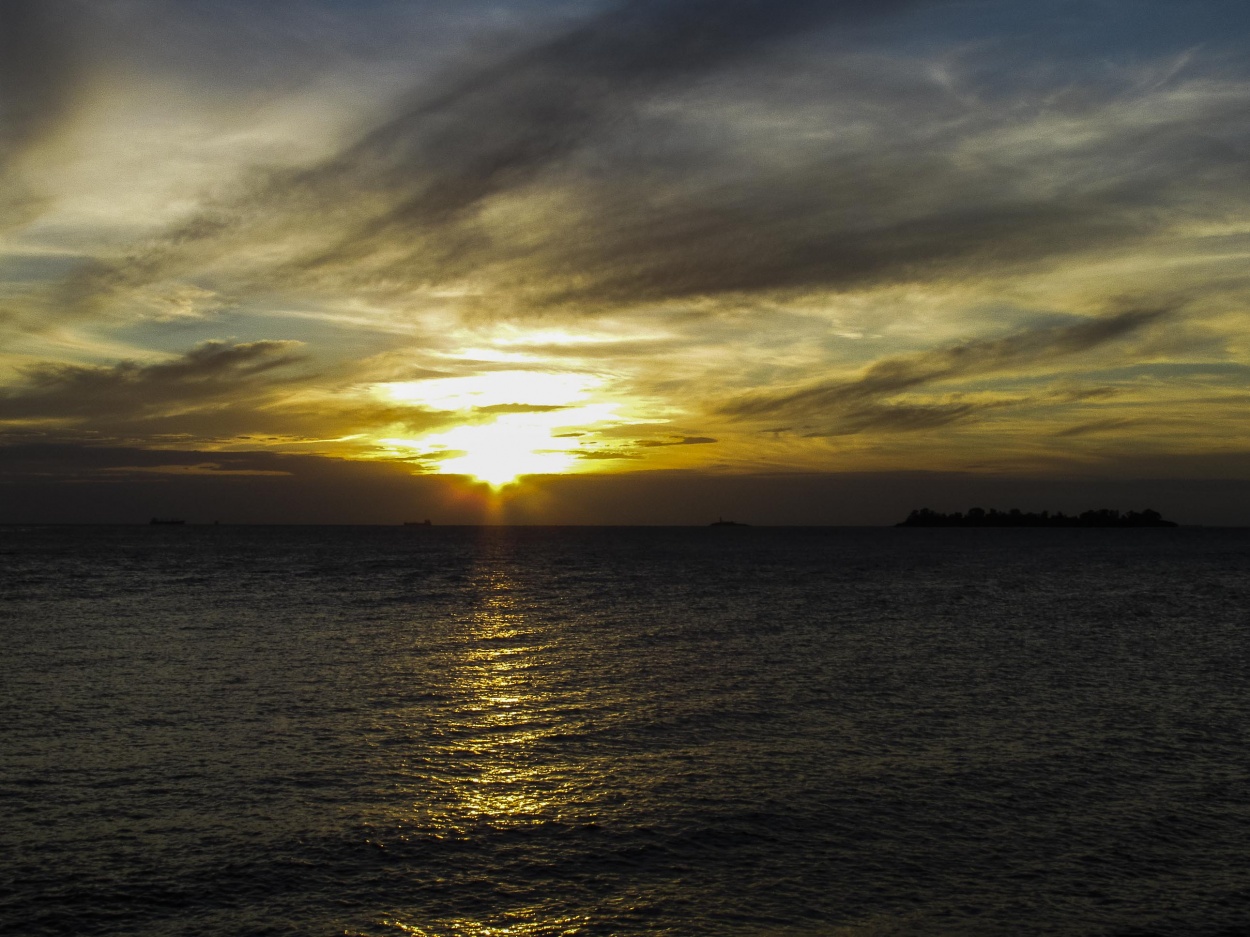 "Atardecer con nubes" de Roxana Dicianni