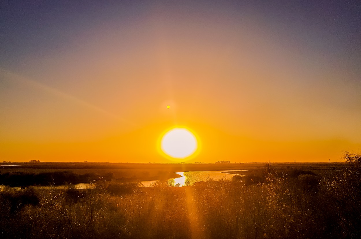 "Atardecer en el ro Salado" de Marzioni Martn Luis