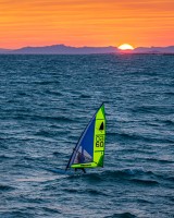 windsurfing at sunset
