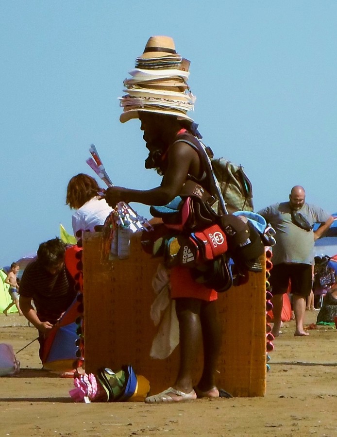 "Vendedor de sombreros" de Americo Rosa Pombinho