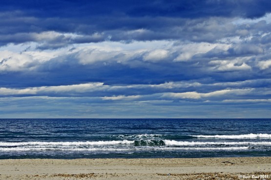 Foto 4/Arena, mar y nubes